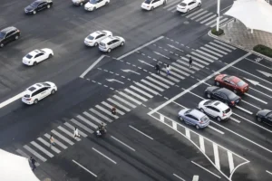Cars at marked pedestrian crossing