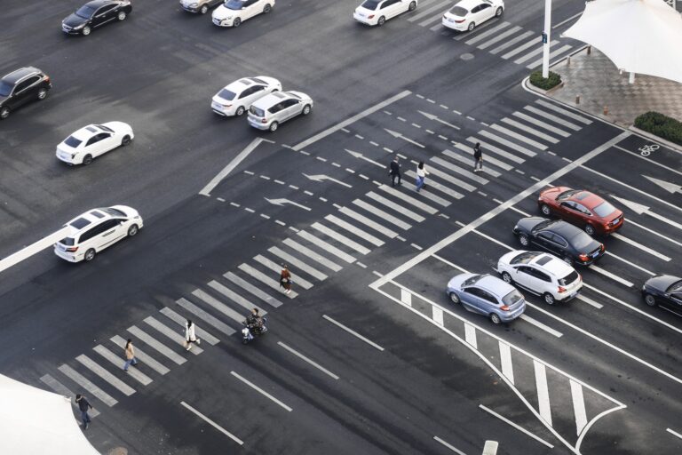 Cars at marked pedestrian crossing