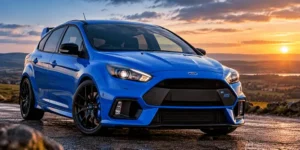 Blue Ford Focus RS parked on a country road at sunset, viewed from the front and side, with its RS badge and sporty bodywork visible.