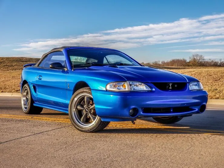 Fourth-generation Ford Mustang coupe with its rounded bodywork and distinctive front styling.