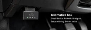 Telematics box fitted beneath a car dashboard