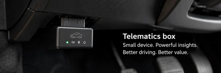 Telematics box fitted beneath a car dashboard