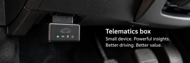 Telematics box fitted beneath a car dashboard