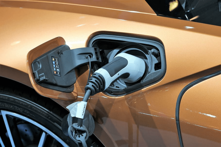 Electric car being charged, battery technology