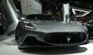 Maserati performance car parked indoors at a car show event