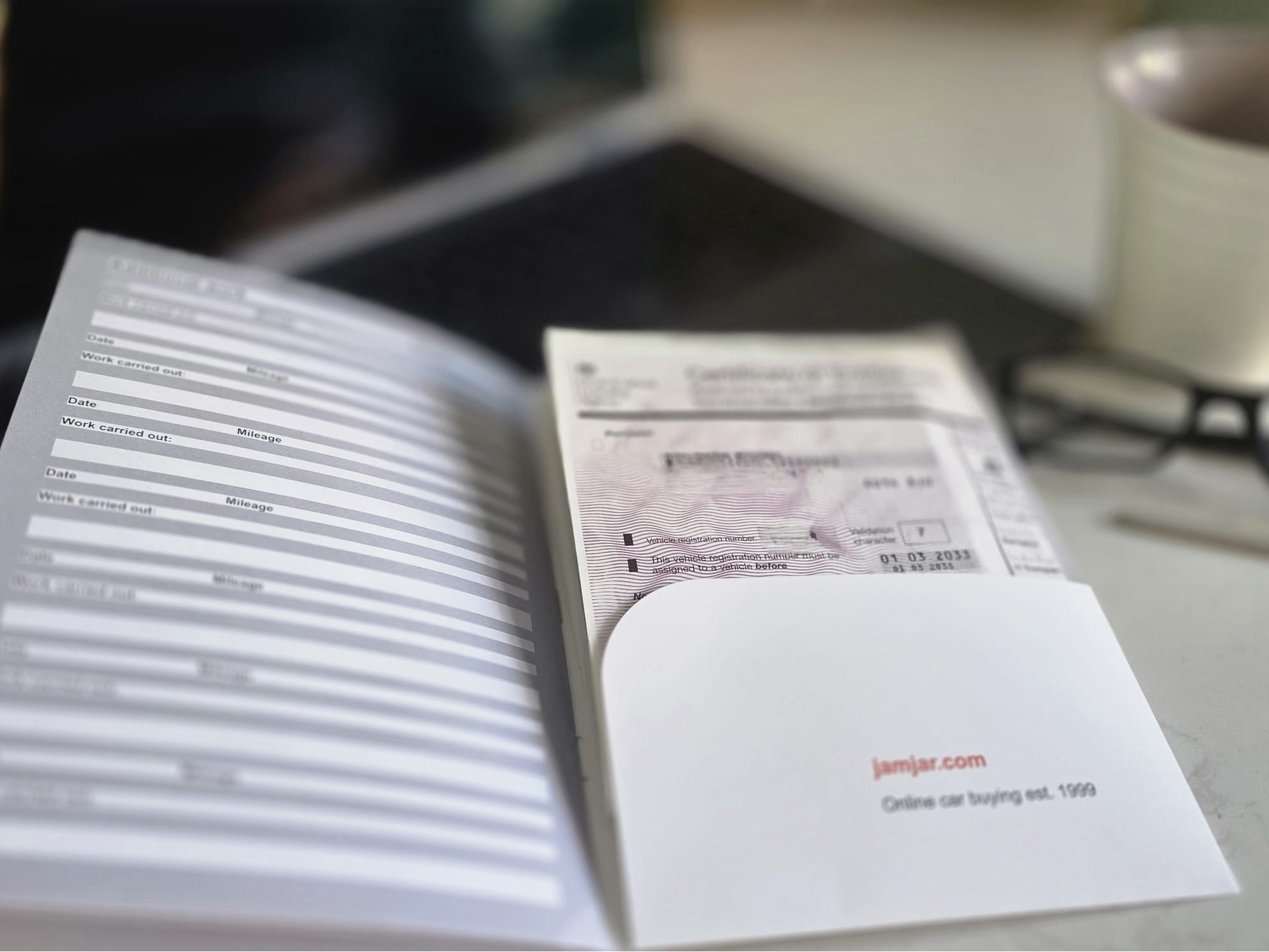 Car service record with dates, mileage and supporting vehicle documents